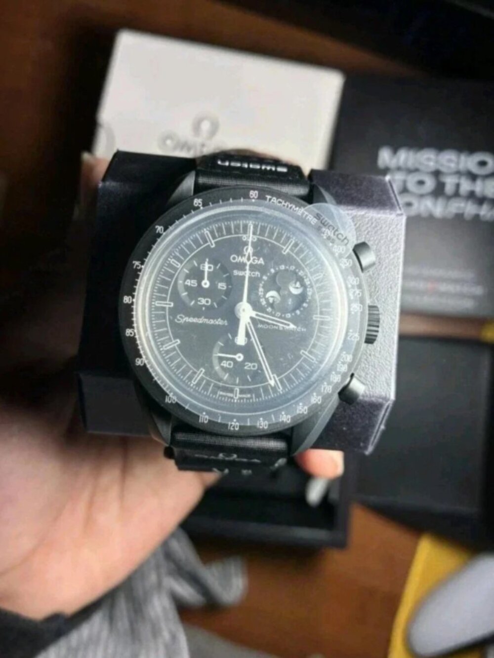 Omega x Swatch Speedmaster Mission to the Moon Black Chronograph Watch.